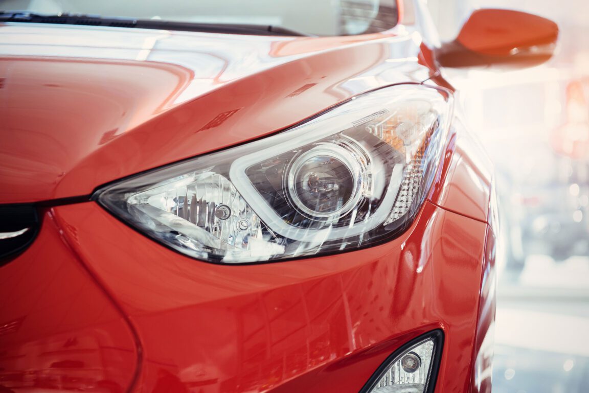 Headlight of a red car